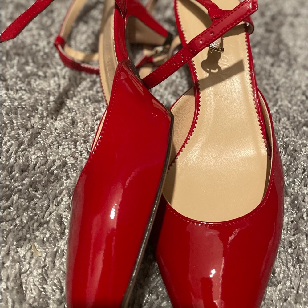 Patent red shoes